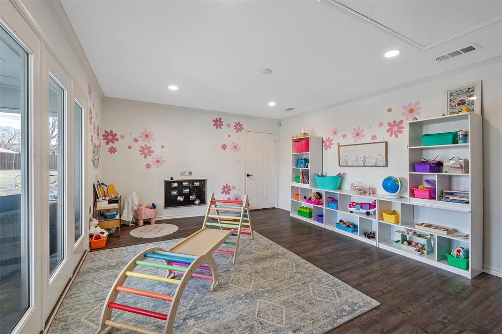 300 Rash Lane Terrell, TX 75160 - Photo 16 of 28 a room with toys and a wooden floor