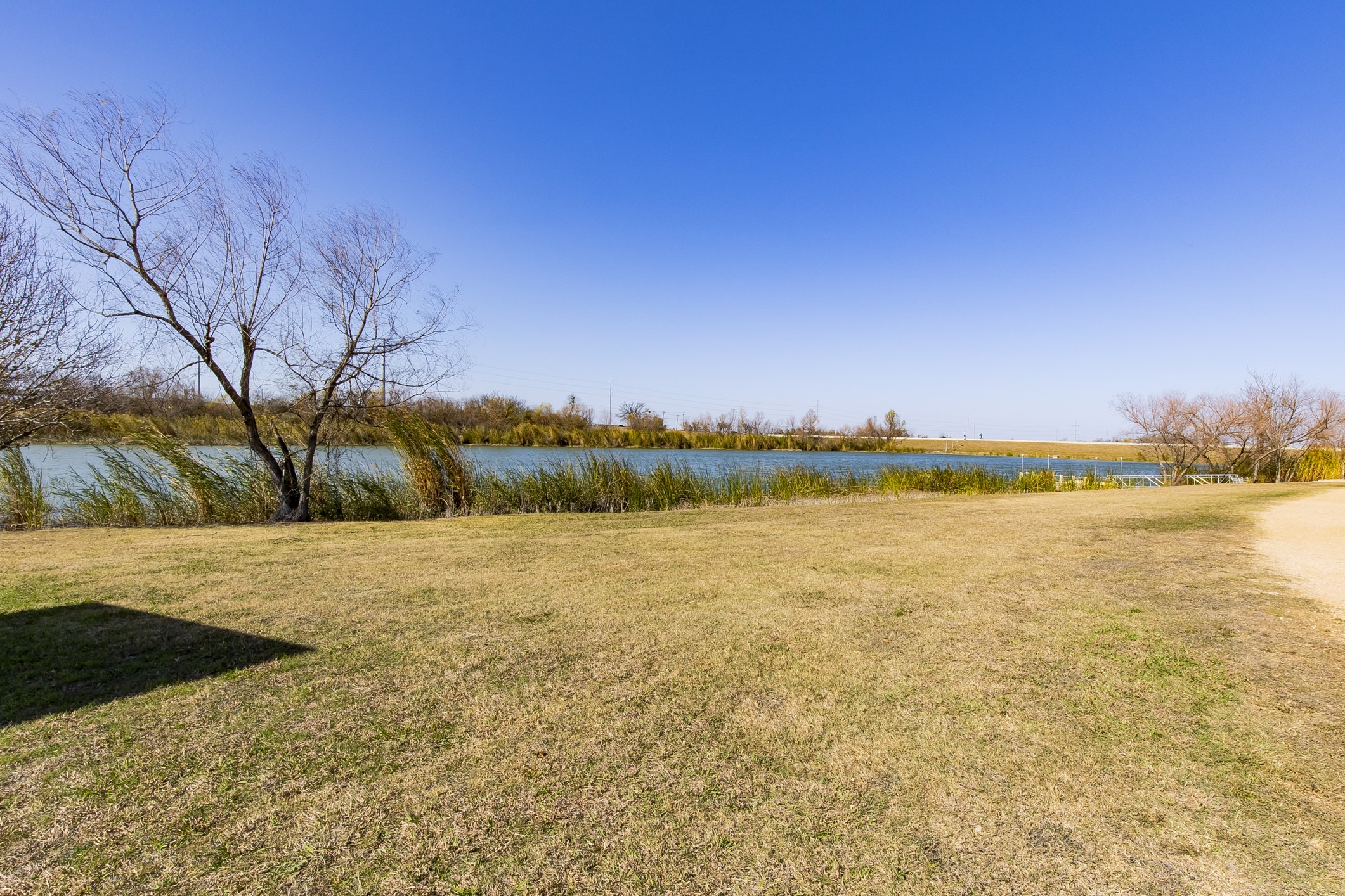 100 Sulphur River Loop Hutto, TX 78634 - Photo 14 of 16 View of grassy yard featuring a water view