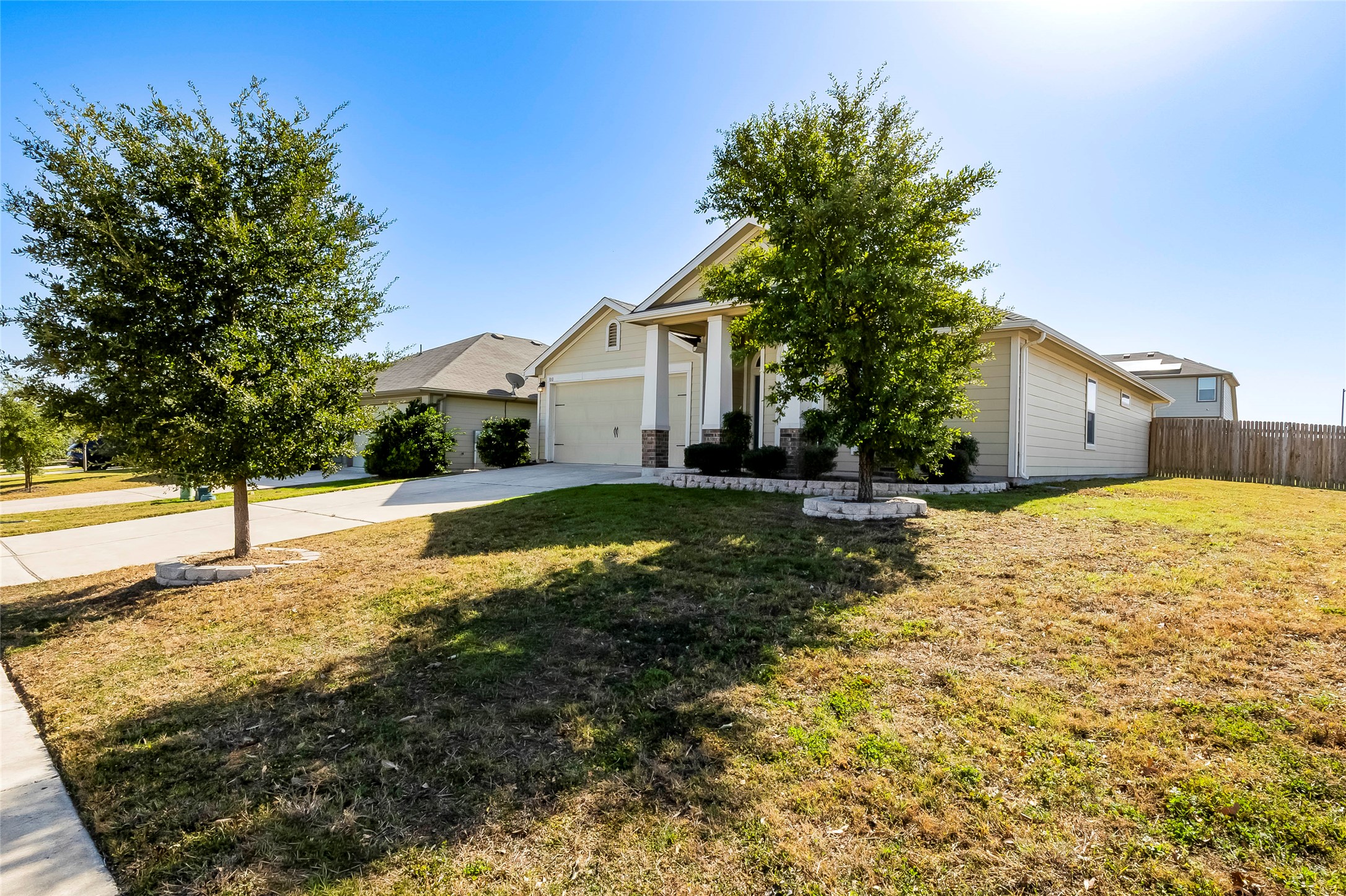 100 Sulphur River Loop Hutto, TX 78634 - Photo 2 of 16 View of front of home with concrete driveway and an attached garage