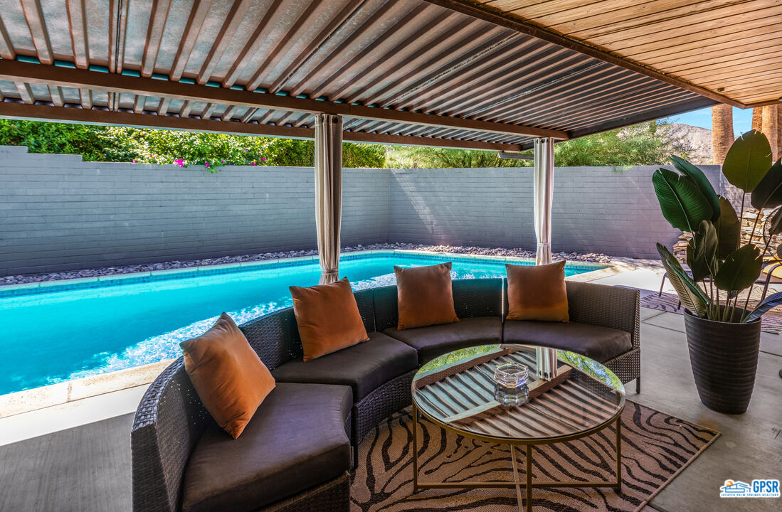 45666 Shadow Mountain Drive Palm Desert, CA 92260 - Photo 34 of 73 a outdoor living space with furniture and garden view