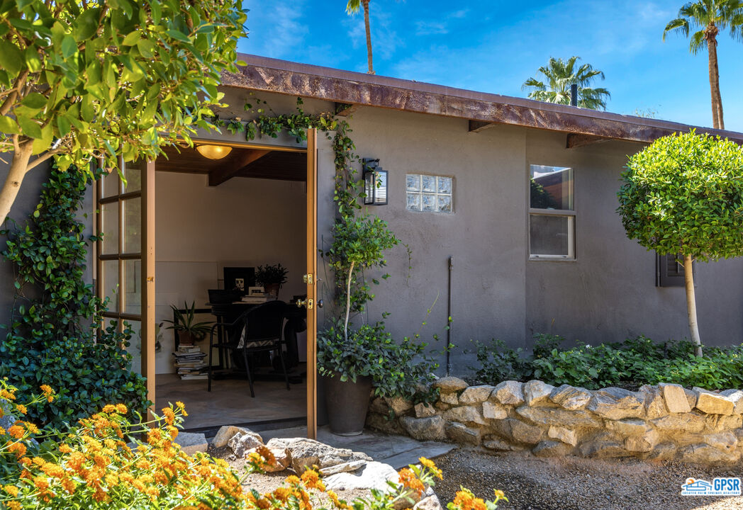 45666 Shadow Mountain Drive Palm Desert, CA 92260 - Photo 50 of 73 a front view of a house with patio
