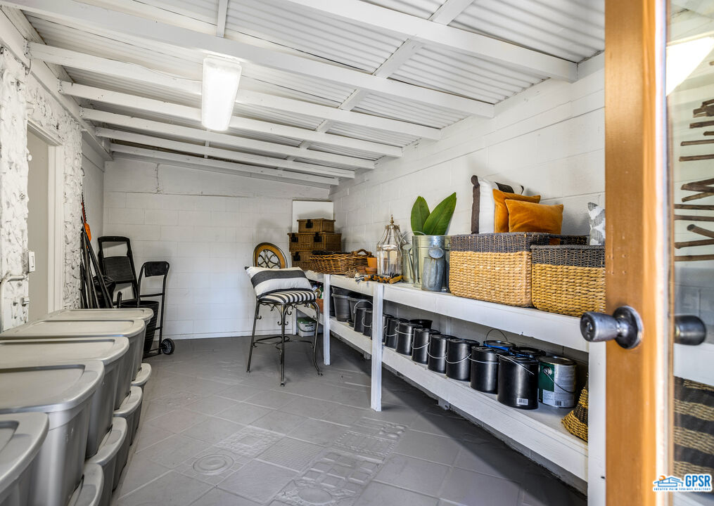 45666 Shadow Mountain Drive Palm Desert, CA 92260 - Photo 56 of 73 a view of a hallway with seating space