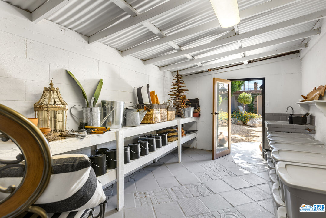 45666 Shadow Mountain Drive Palm Desert, CA 92260 - Photo 57 of 73 a view of a dining room with furniture window and wooden floor