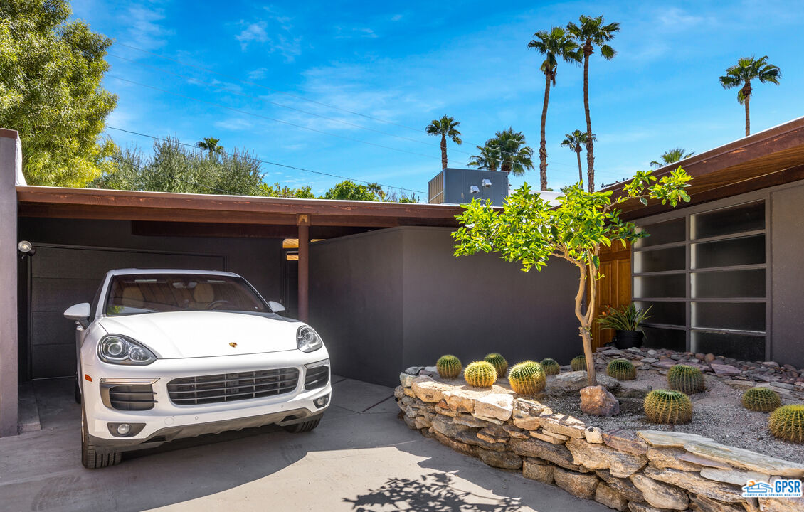 45666 Shadow Mountain Drive Palm Desert, CA 92260 - Photo 6 of 73 a car parked in front of a house