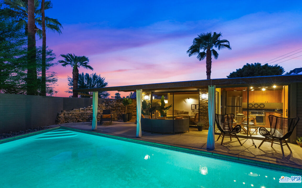 45666 Shadow Mountain Drive Palm Desert, CA 92260 - Photo 66 of 73 a view of a chairs and table in patio with a backyard