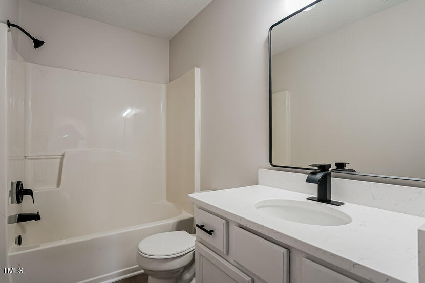 413 Hanska Way Raleigh, NC 27610 - Photo 14 of 15 013-photo-bathroom-14616739