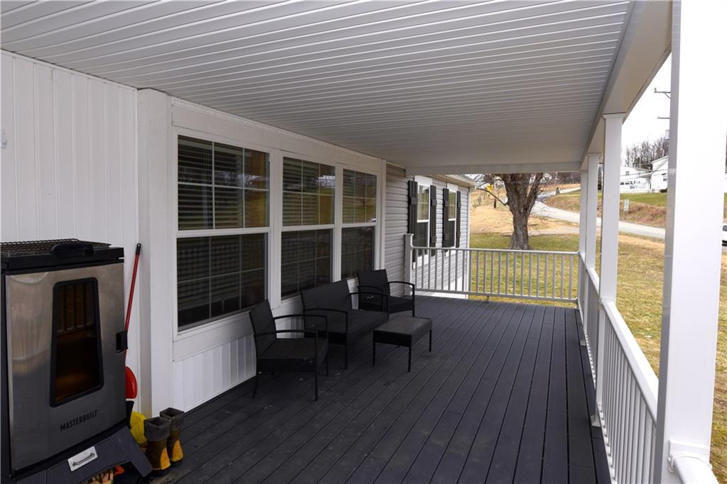 109 Clarksville Road Clarksville, PA 15322 - Photo 3 of 18 Spacious front porch with TREX decking