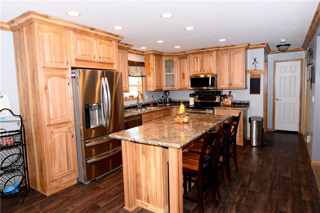 109 Clarksville Road Clarksville, PA 15322 - Photo 8 of 18 includes stainless appliances and look at that island and crown molding!