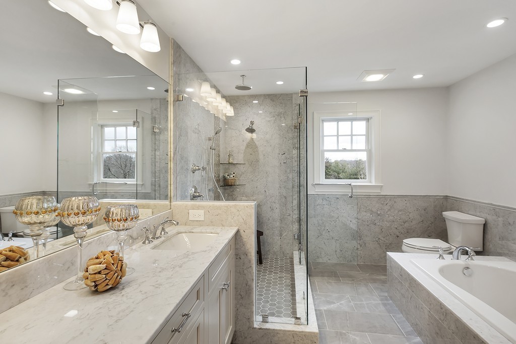 6 Johnson Road Winchester, MA 01890 - Photo 19 of 30 a bathroom with a sink double vanity and a shower