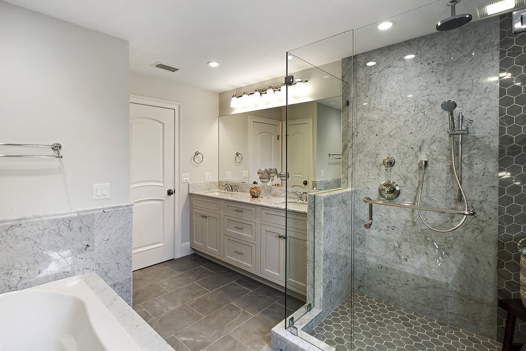 6 Johnson Road Winchester, MA 01890 - Photo 20 of 30 a bathroom with a sink mirror and a shower