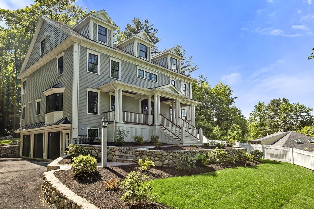 6 Johnson Road Winchester, MA 01890 - Photo 2 of 30 a front view of a house with garden