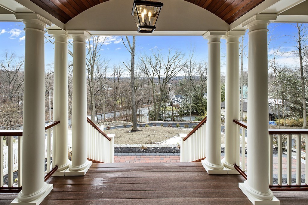 6 Johnson Road Winchester, MA 01890 - Photo 3 of 30 a view of a balcony with wooden floor and door