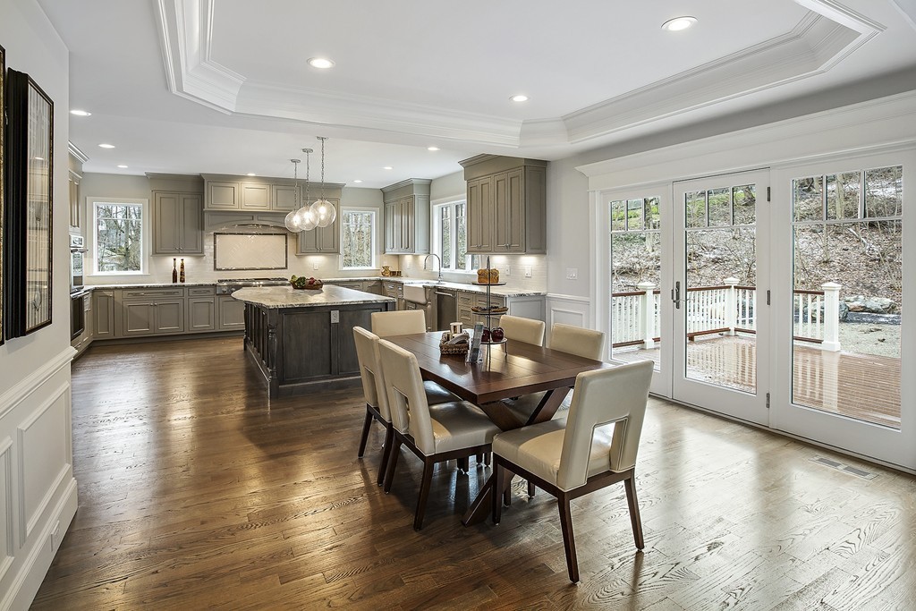 6 Johnson Road Winchester, MA 01890 - Photo 9 of 30 a view of a dining room with furniture window and wooden floor