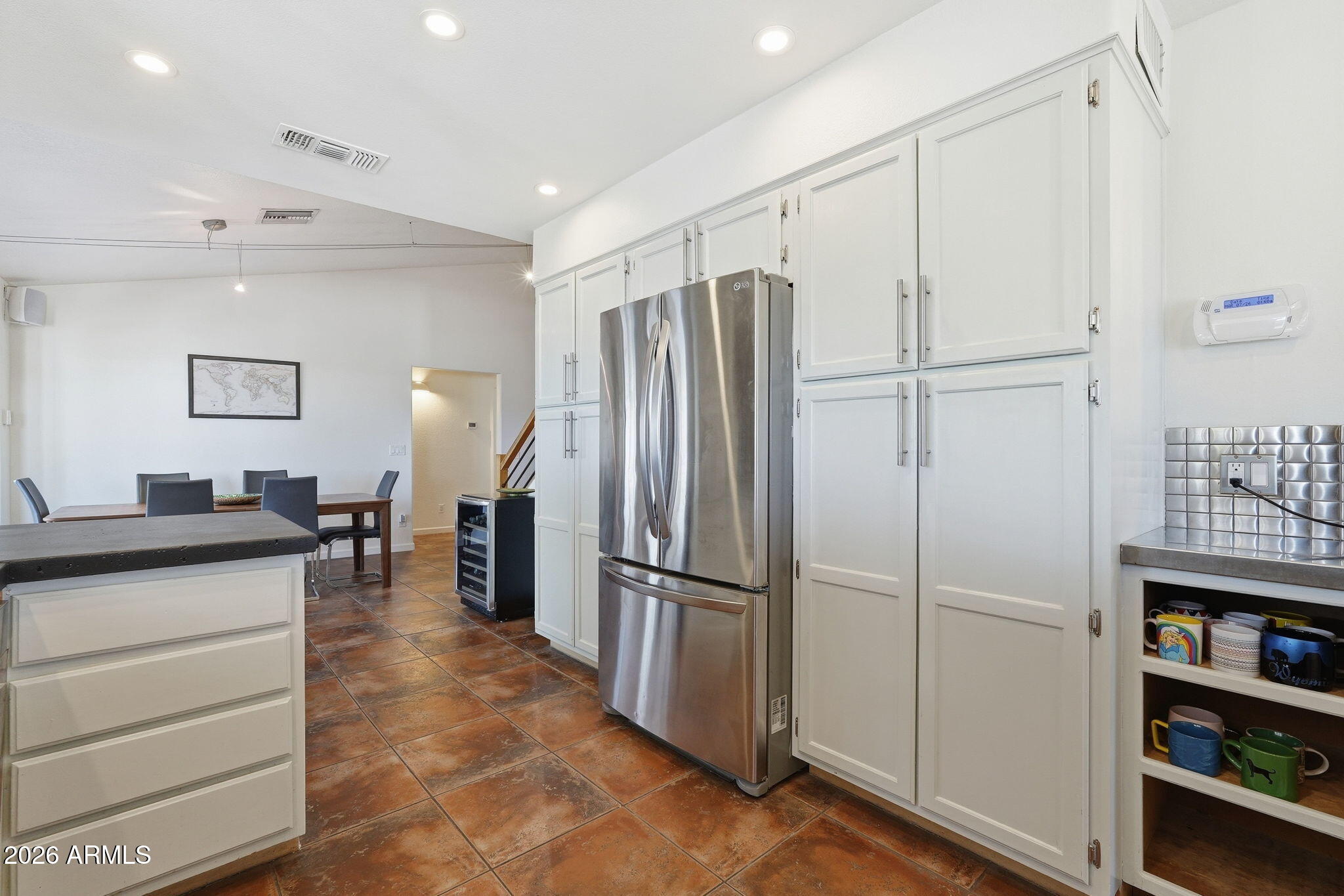 13619 North 18th Street Phoenix, AZ 85022 - Photo 12 of 53 a kitchen with stainless steel appliances granite countertop a refrigerator and a sink