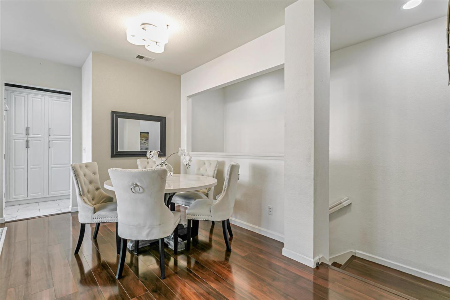 3657 Jasmine Circle San Jose, CA 95135 - Photo 16 of 62 a view of a dining room with furniture and wooden floor