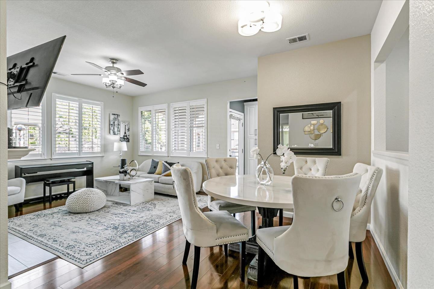 3657 Jasmine Circle San Jose, CA 95135 - Photo 2 of 62 a view of a dining room with furniture window and wooden floor