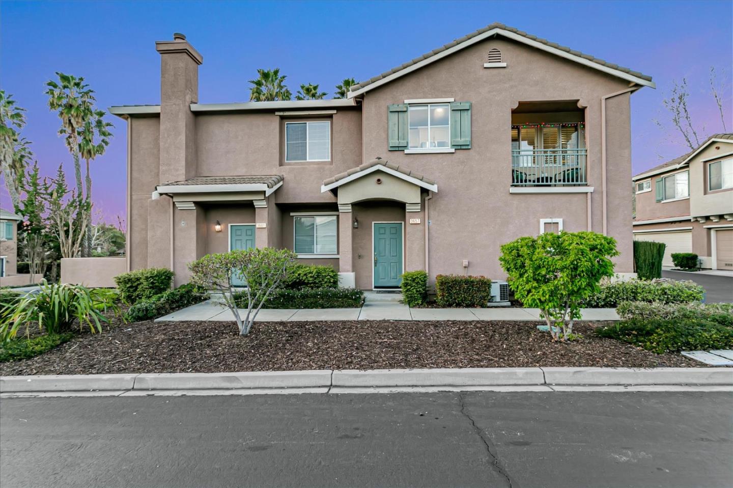 3657 Jasmine Circle San Jose, CA 95135 - Photo 40 of 62 a front view of a house with a yard and garage