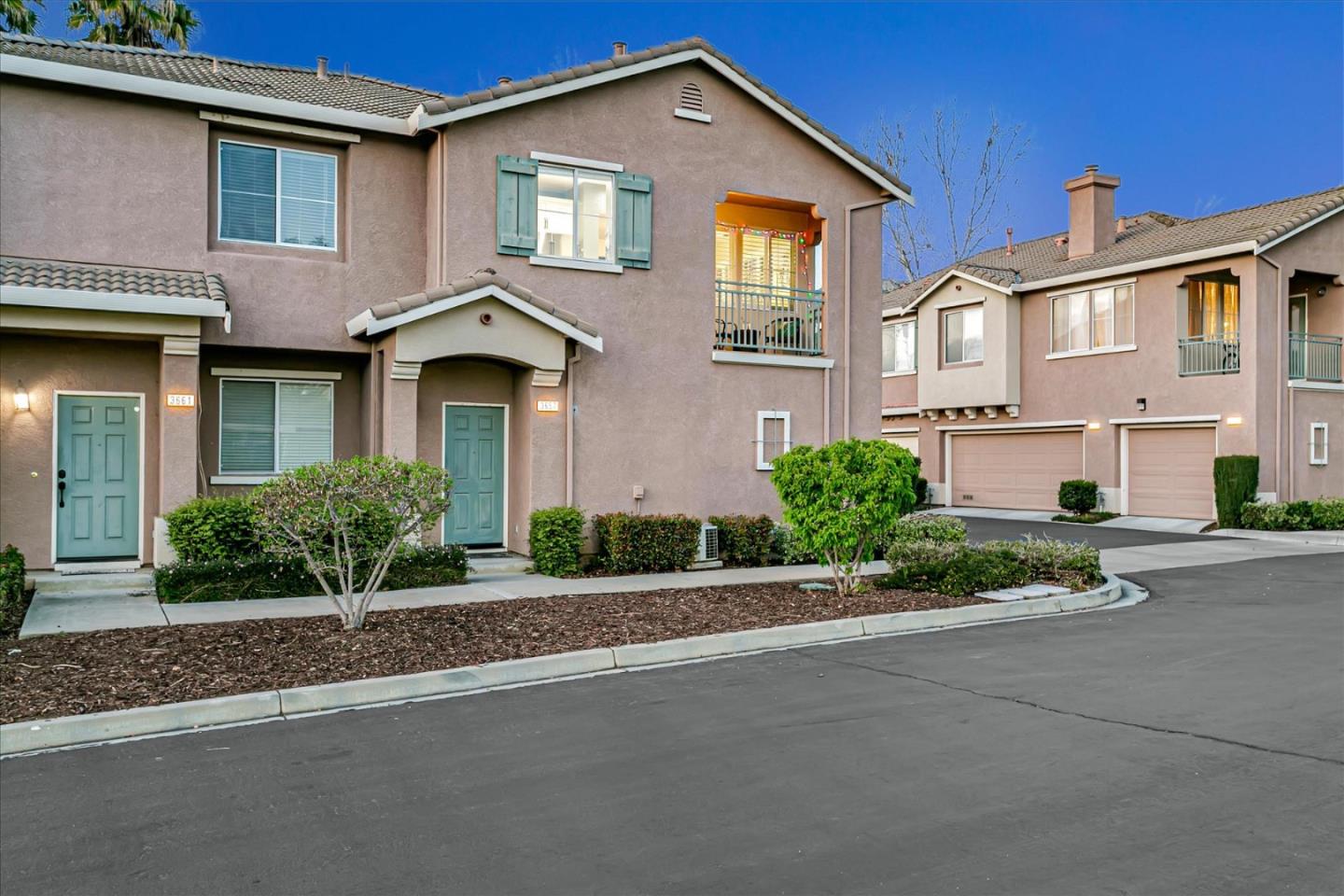 3657 Jasmine Circle San Jose, CA 95135 - Photo 49 of 62 a front view of a house with a yard and garage