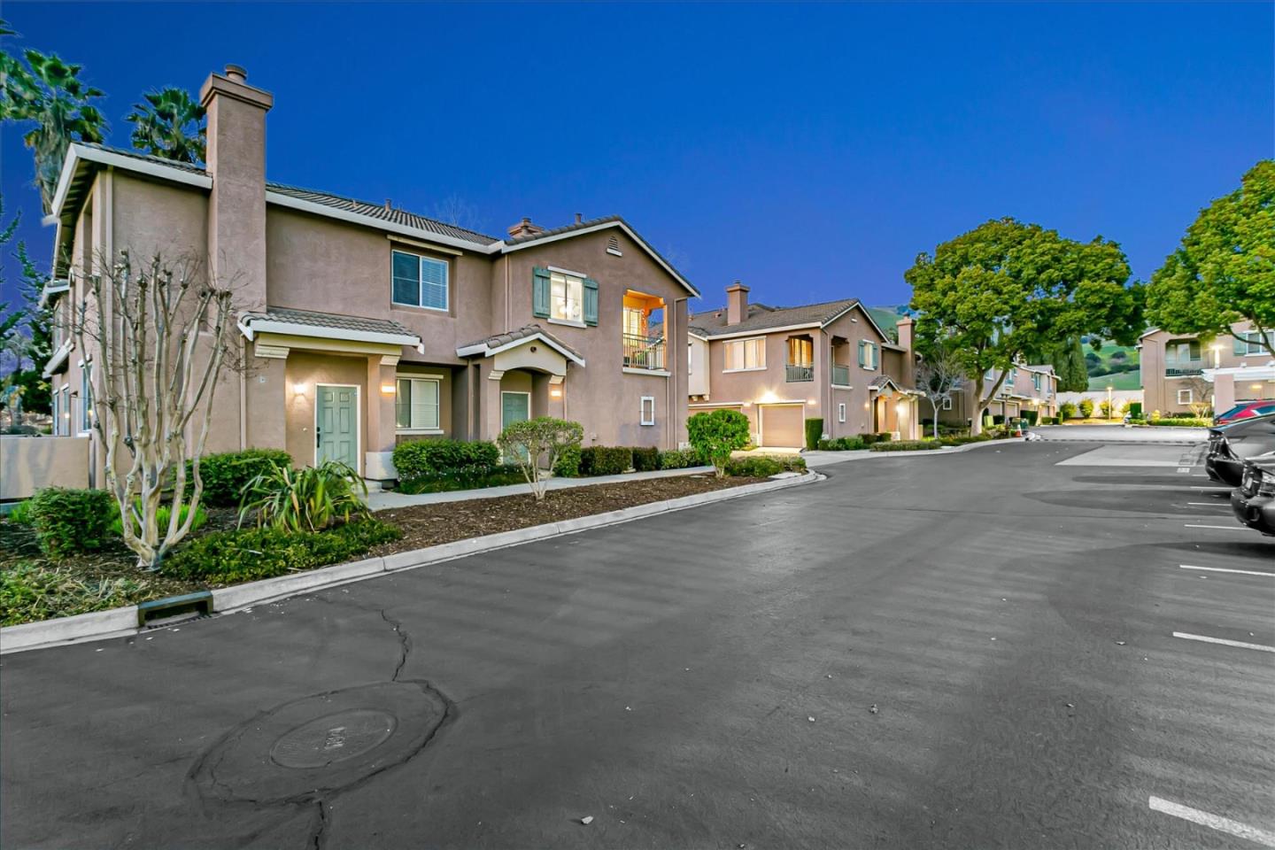 3657 Jasmine Circle San Jose, CA 95135 - Photo 51 of 62 a view of a street with a house in the background
