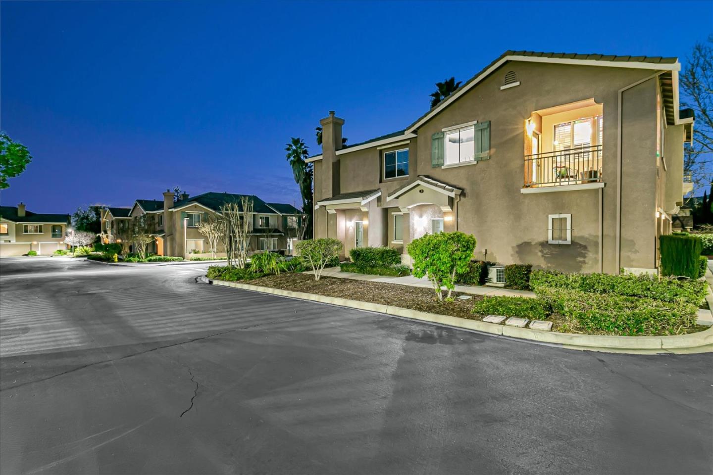 3657 Jasmine Circle San Jose, CA 95135 - Photo 59 of 62 a front view of a house with a yard and outdoor seating
