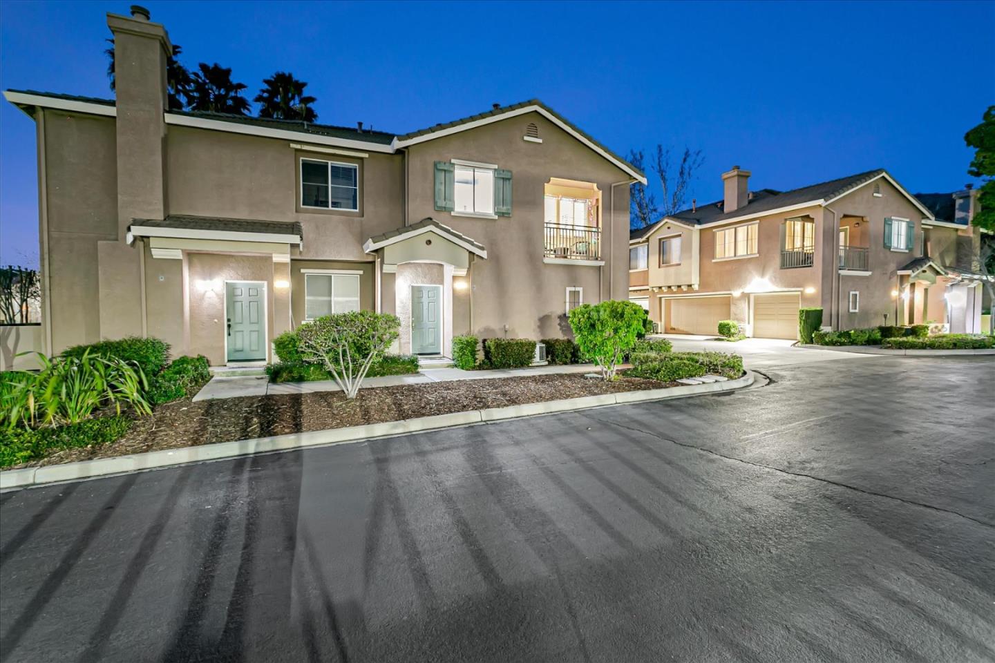 3657 Jasmine Circle San Jose, CA 95135 - Photo 60 of 62 a front view of a house with a yard