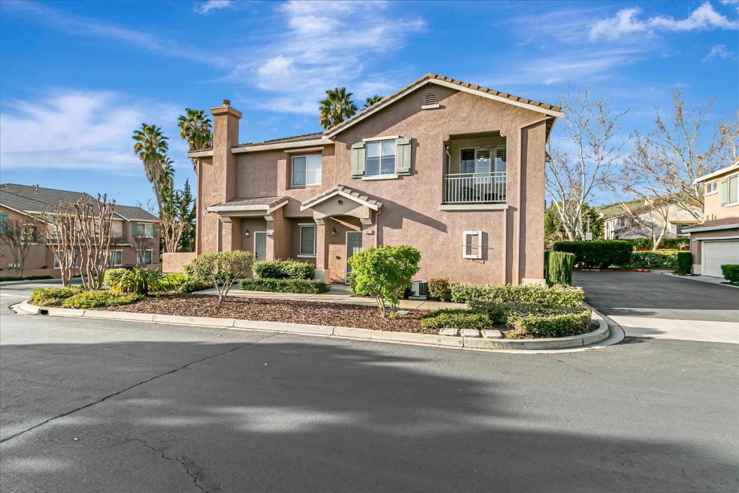 3657 Jasmine Circle San Jose, CA 95135 - Photo 8 of 62 a front view of a house with a yard
