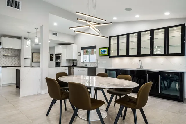 a kitchen with a sink counter top space and appliances