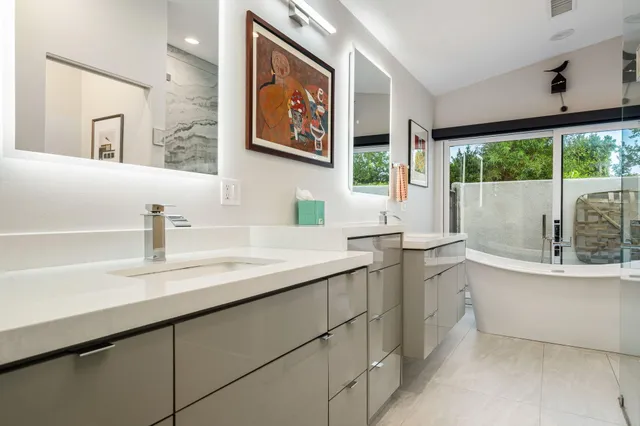 a view of a workspace with furniture