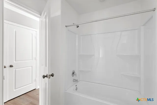 a bathroom with a bathtub