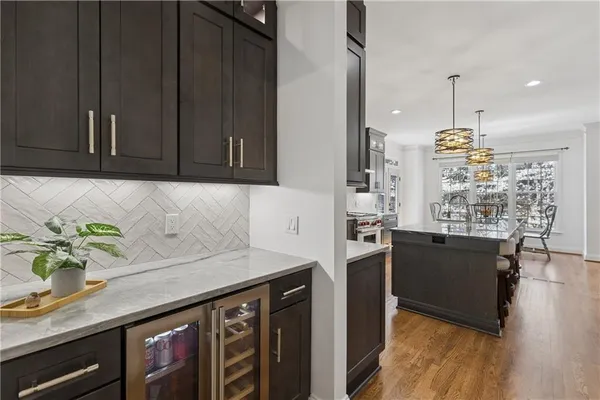 a living room with fireplace furniture and a flat screen tv