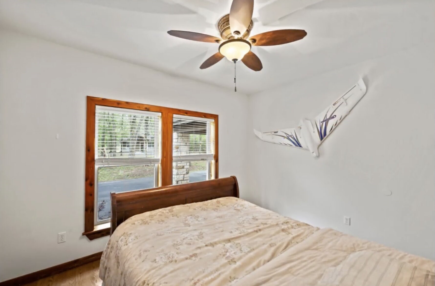 30338 Riley Road Waller, TX 77484 - Photo 26 of 46 a bedroom with a large bed and a large window