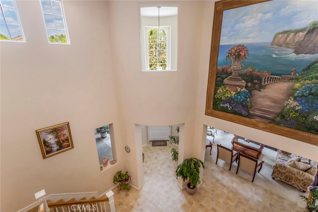 25808 Tennyson Lane Stevenson Ranch, CA 91381 - Photo 28 of 74 a living room with furniture and a potted plant