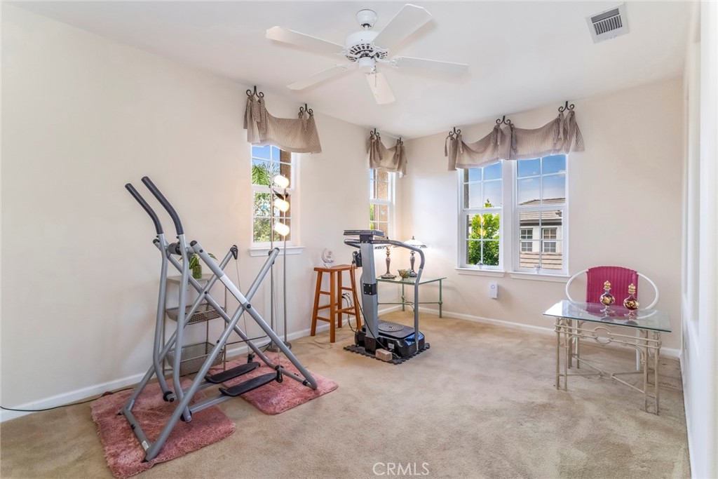 25808 Tennyson Lane Stevenson Ranch, CA 91381 - Photo 32 of 74 a view of a room with gym equipment