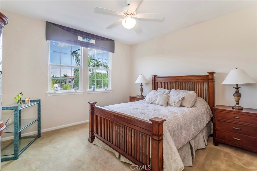 25808 Tennyson Lane Stevenson Ranch, CA 91381 - Photo 36 of 74 a bedroom with a bed and a window
