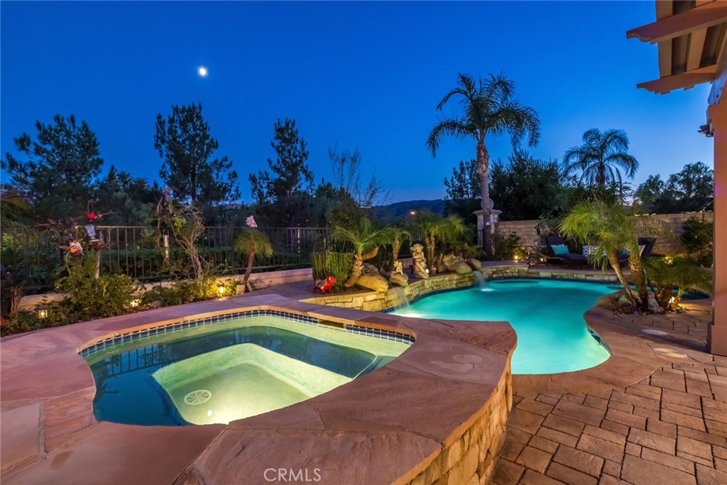 25808 Tennyson Lane Stevenson Ranch, CA 91381 - Photo 4 of 74 a view of a house with swimming pool and sitting area