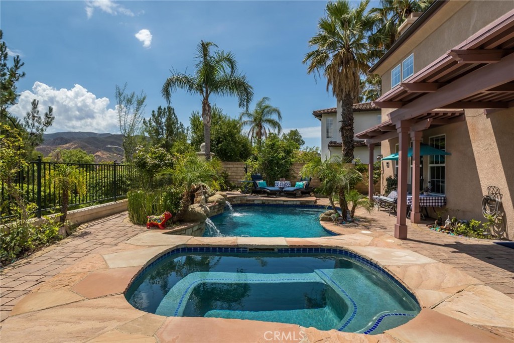 25808 Tennyson Lane Stevenson Ranch, CA 91381 - Photo 50 of 74 a view of a swimming pool with a patio