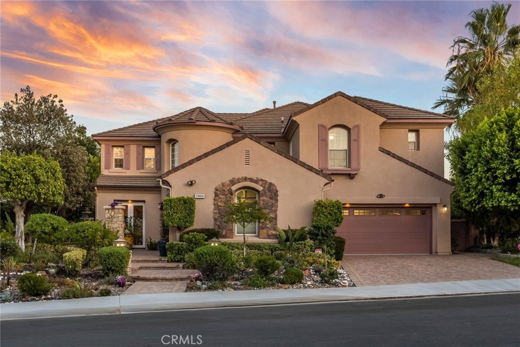 25808 Tennyson Lane Stevenson Ranch, CA 91381 - Photo 51 of 74 front view of a house with a yard