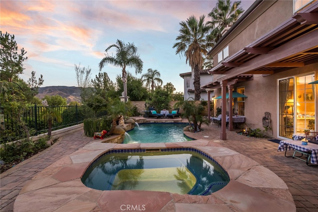 25808 Tennyson Lane Stevenson Ranch, CA 91381 - Photo 58 of 74 a view of swimming pool with outdoor seating and plants