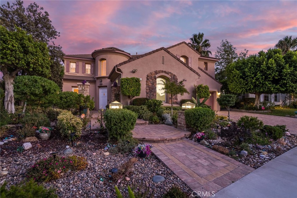 25808 Tennyson Lane Stevenson Ranch, CA 91381 - Photo 60 of 74 a front view of a house with garden