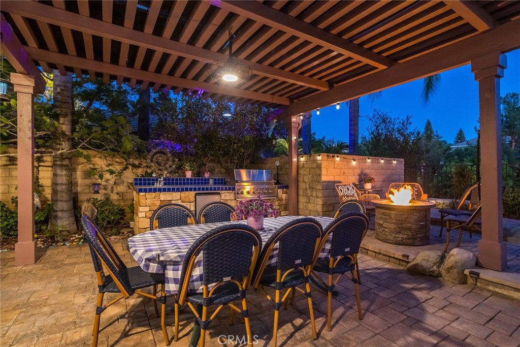 25808 Tennyson Lane Stevenson Ranch, CA 91381 - Photo 64 of 74 a view of a chairs and table in patio