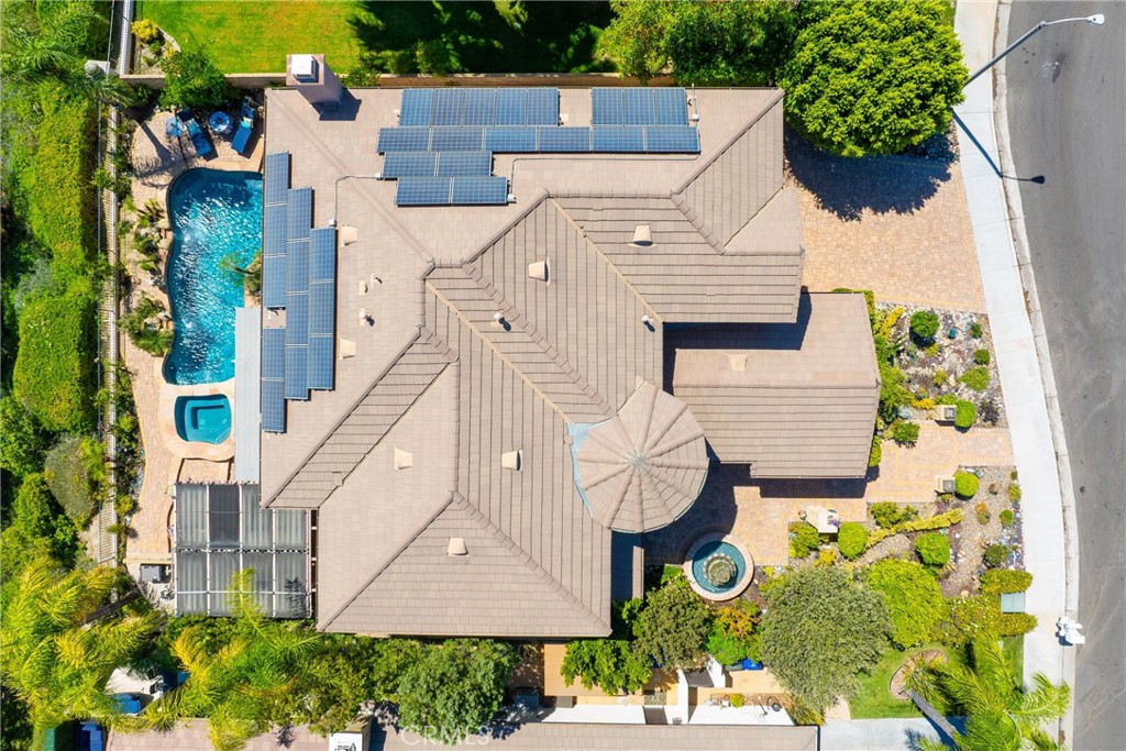 25808 Tennyson Lane Stevenson Ranch, CA 91381 - Photo 72 of 74 an aerial view of a house with a yard and potted plants