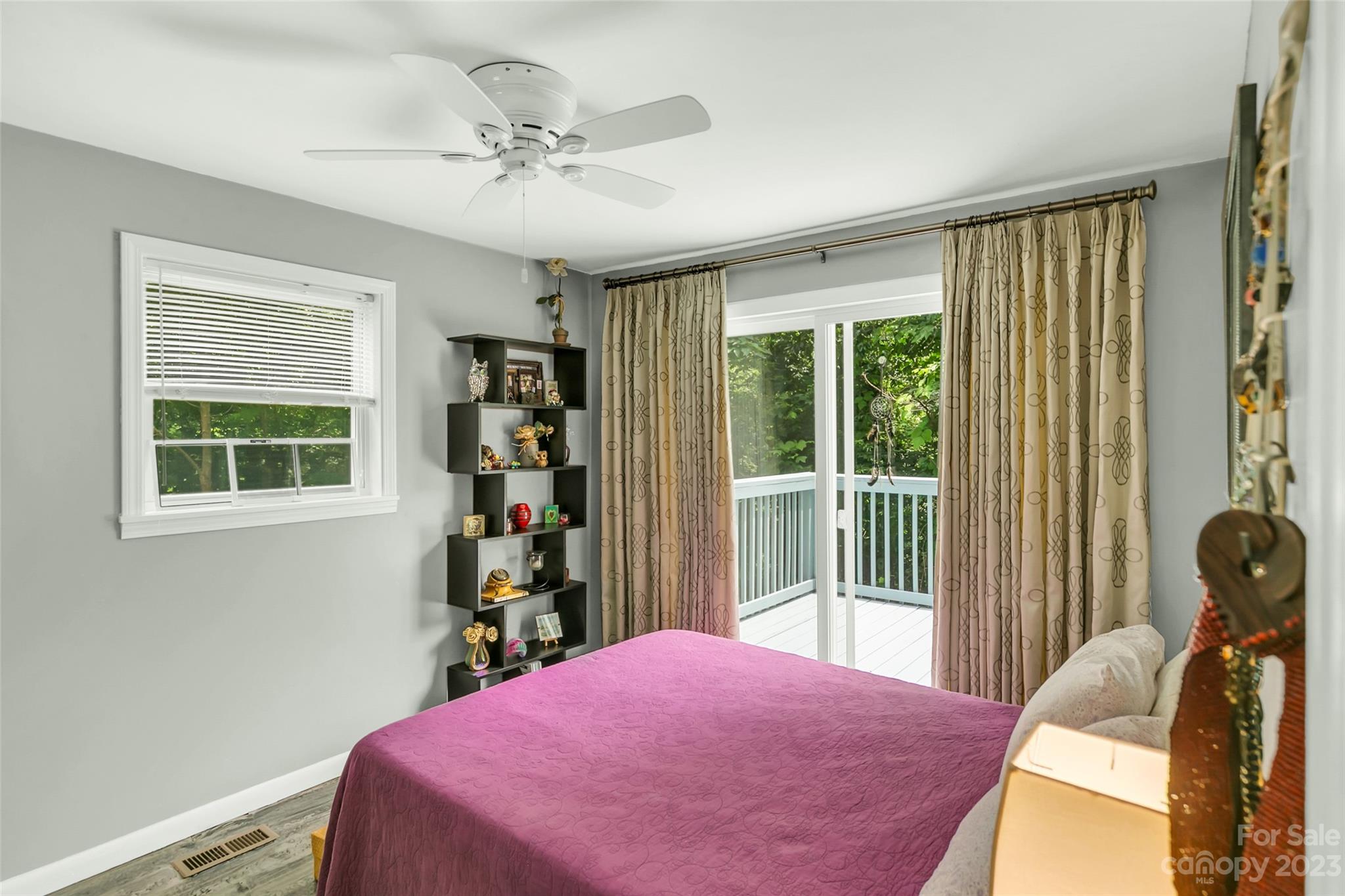 83 East View Street Marion, NC 28752 - Photo 12 of 24 a bedroom with a bed and a window