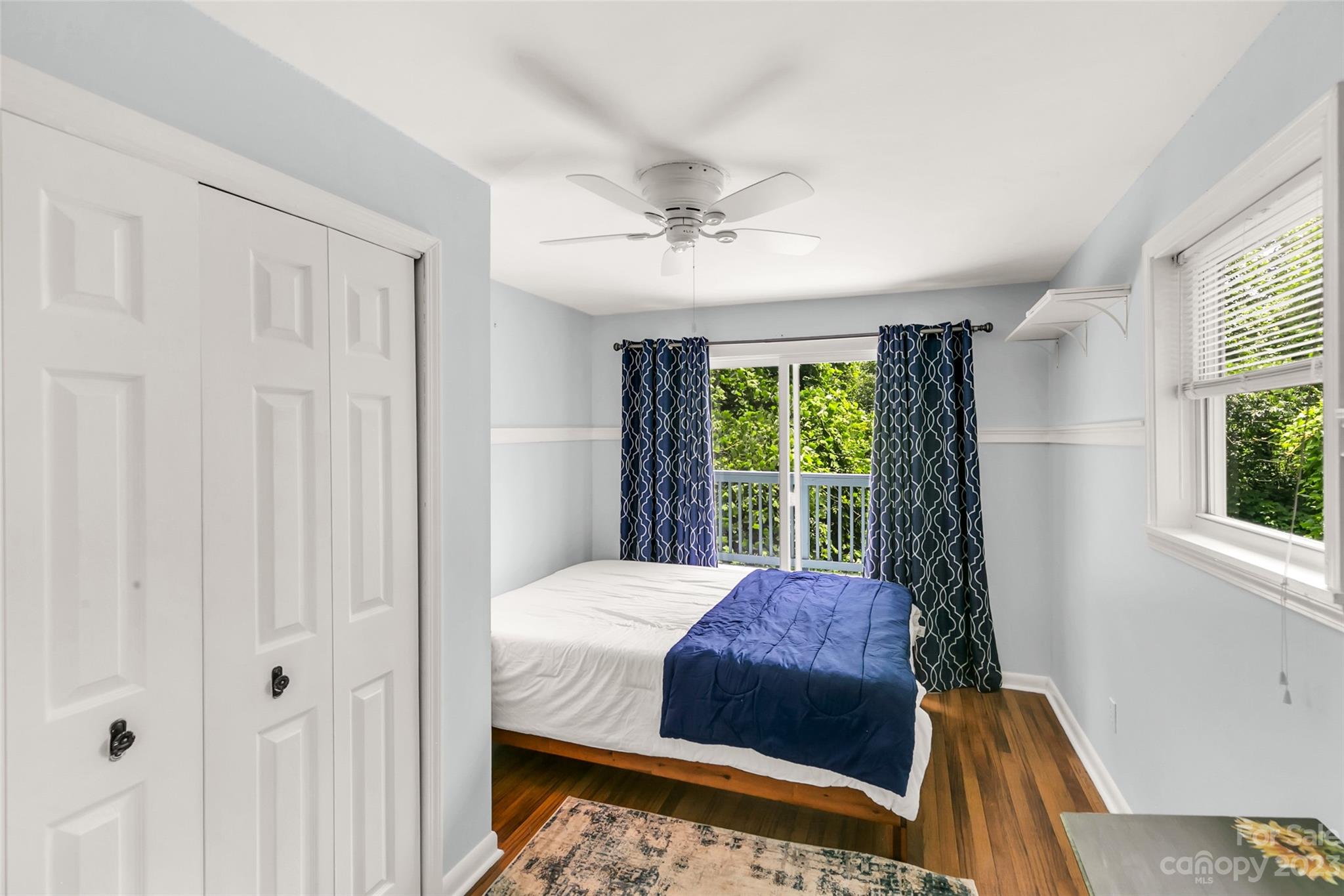 83 East View Street Marion, NC 28752 - Photo 15 of 24 a bedroom with a bed and a window