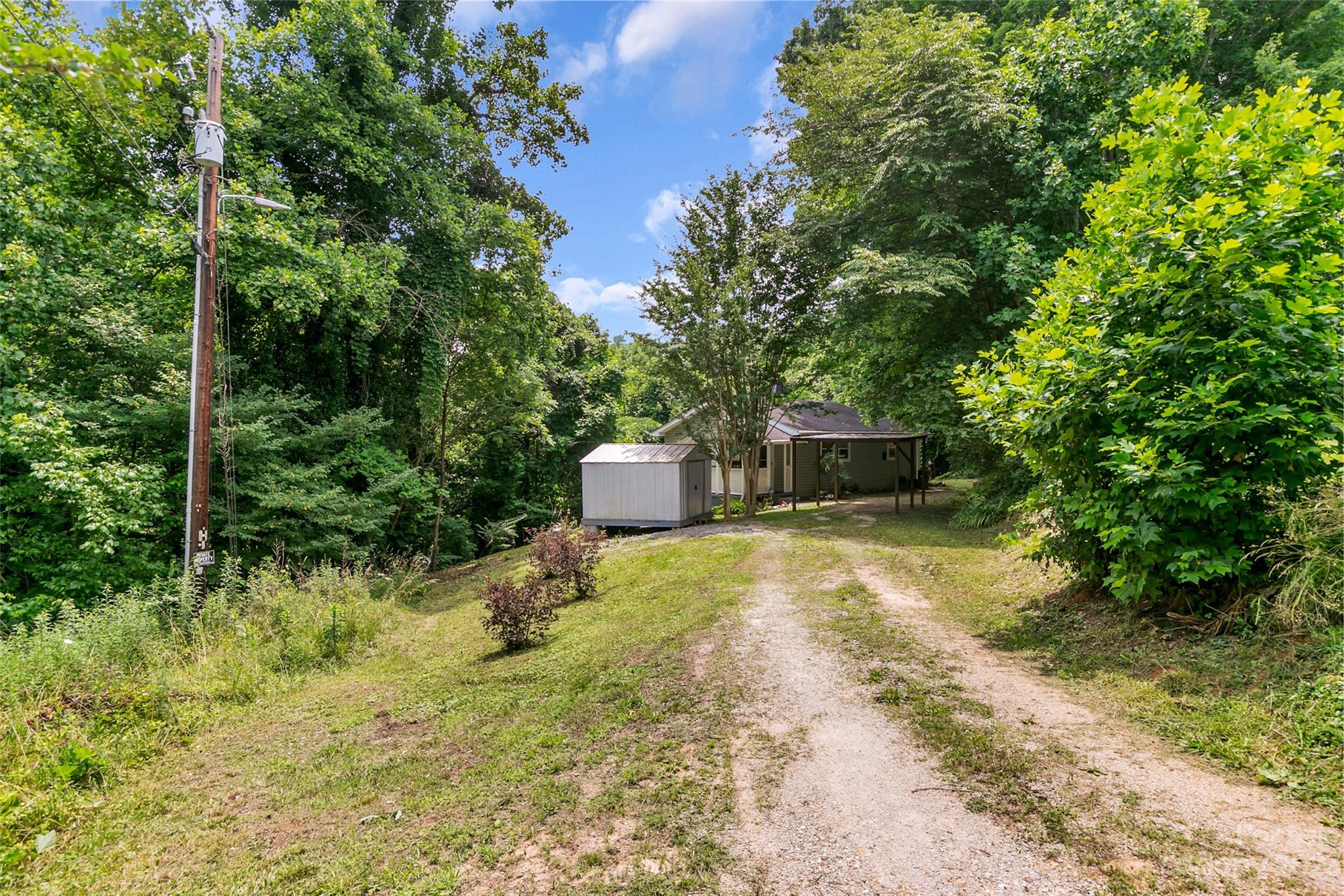 83 East View Street Marion, NC 28752 - Photo 18 of 24 a pathway of a yard