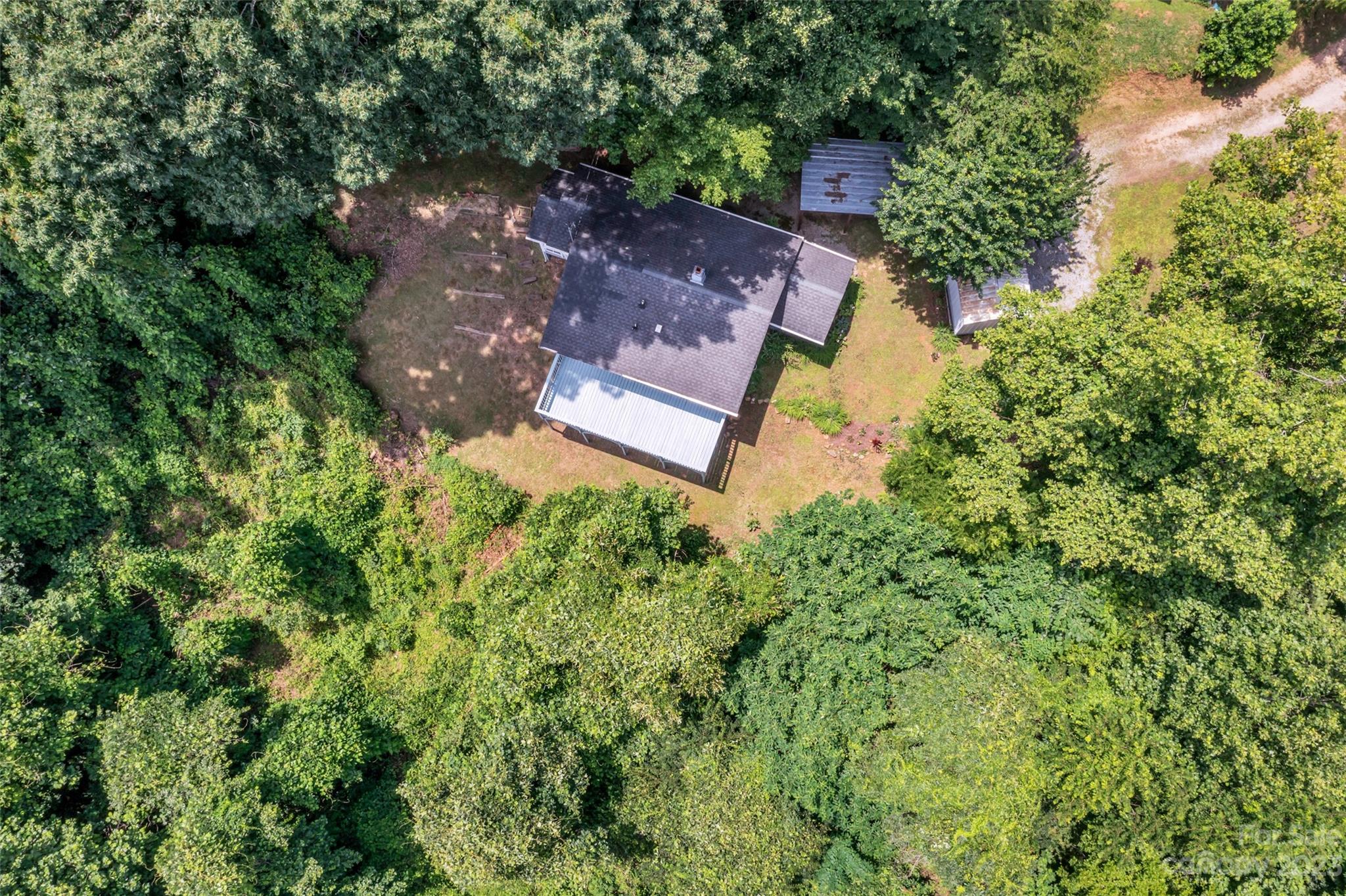 83 East View Street Marion, NC 28752 - Photo 3 of 24 an aerial view of a house with a yard