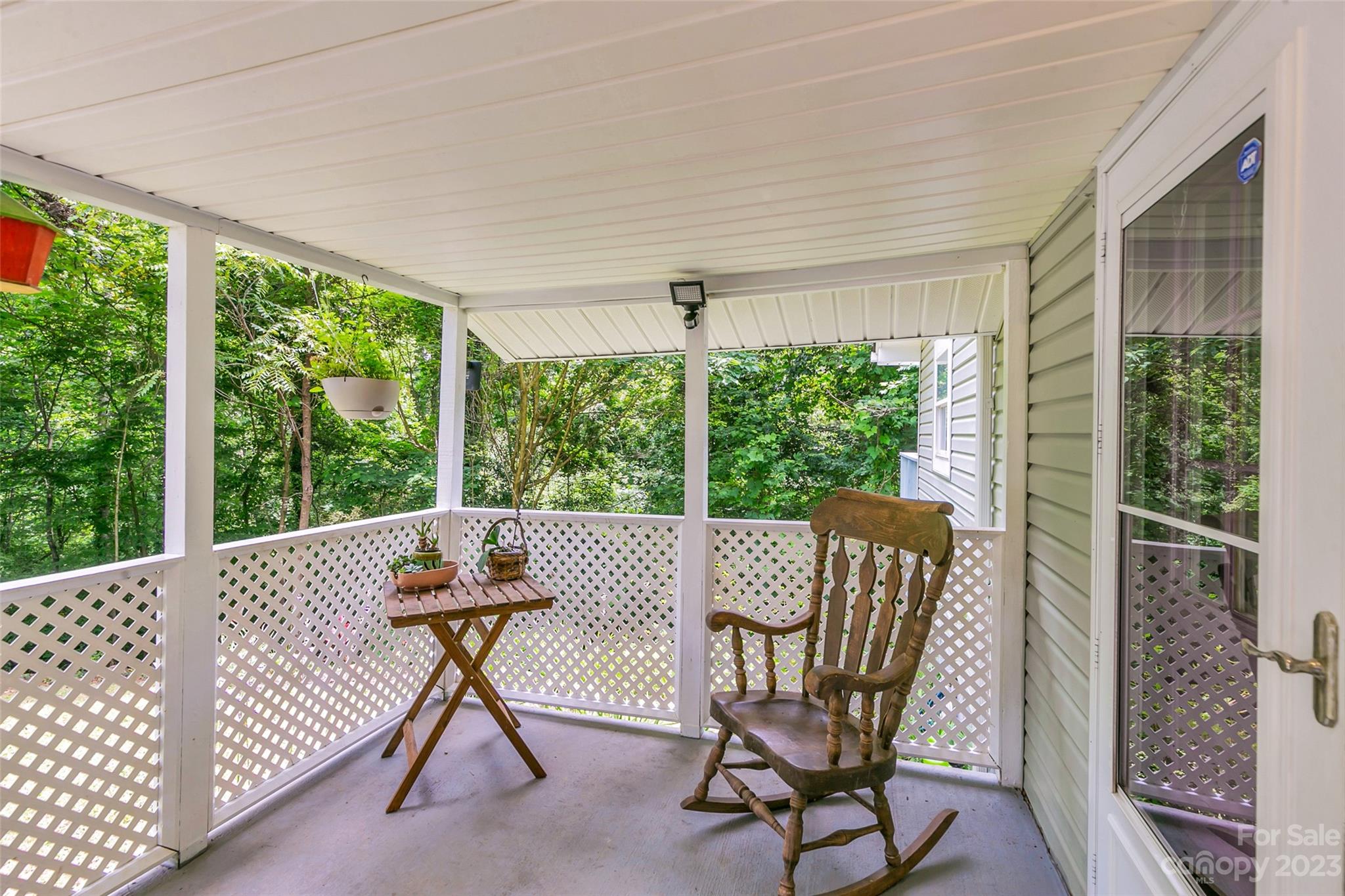 83 East View Street Marion, NC 28752 - Photo 4 of 24 a view of a patio with a table and chairs