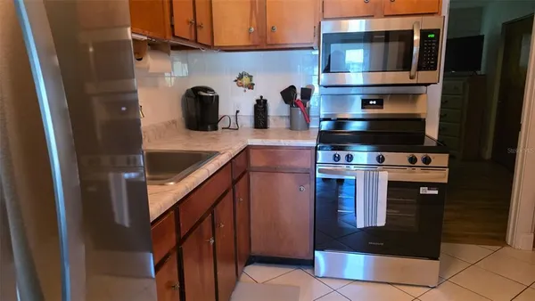 a bedroom with a bed and cabinets