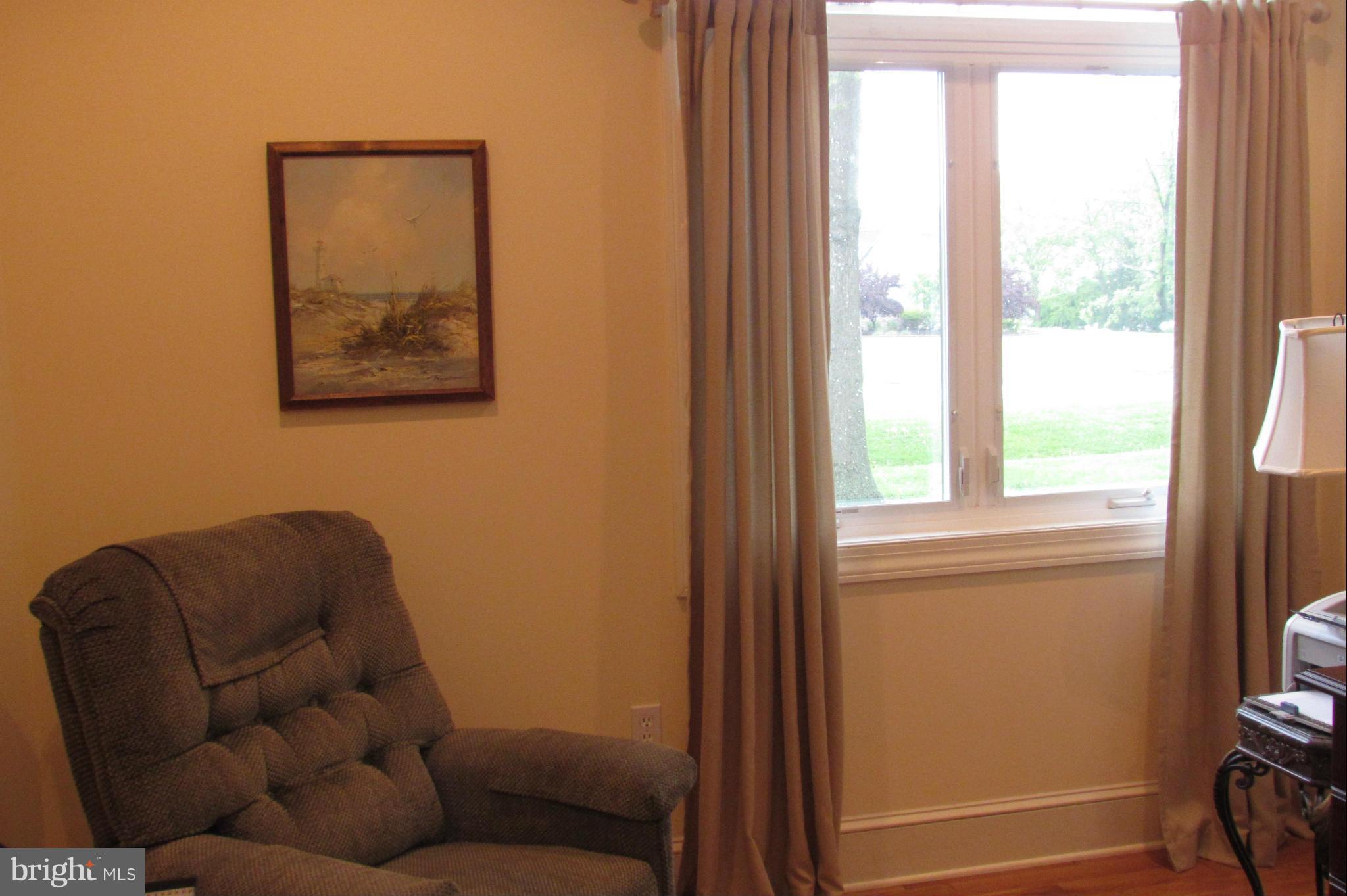201 Greenwood Creek Road Queenstown, MD 21658 - Photo 24 of 25 a view of a livingroom with furniture and a window