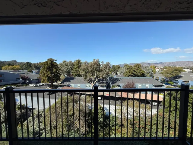 a view of city from a balcony