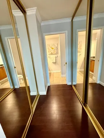 a bathroom with a sink a mirror and vanity